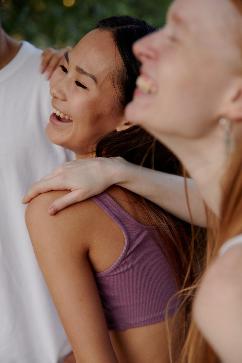Two friends laughing together